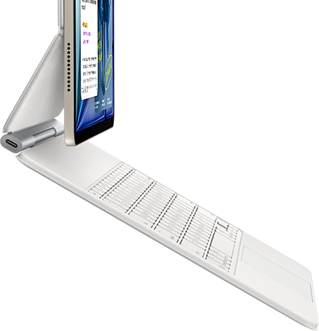 iPad Air, color blanco estrella, acoplado a un Magic Keyboard, color blanco, lateral exterior