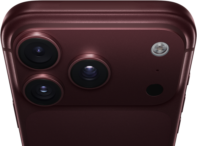 iPhone 18 Pro Max, color burdeos (rojo oscuro), parte trasera exterior, sistema de cámaras Pro Fusion en la parte superior, tres objetivos, láminas de apertura variable parcialmente cerradas, flash, micrófono y escáner LiDAR, parte superior exterior, antena de red móvil, laterales planos, esquinas redondeadas