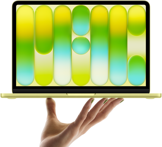 MacBook Neo en color cítrico, portátil sobre las puntas de los dedos de una mano abierta, diseño abstracto a todo color en la pantalla