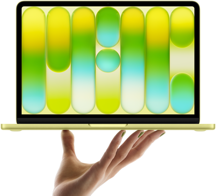 MacBook Neo en color cítrico, portátil sobre las puntas de los dedos de una mano abierta, diseño abstracto a todo color en la pantalla